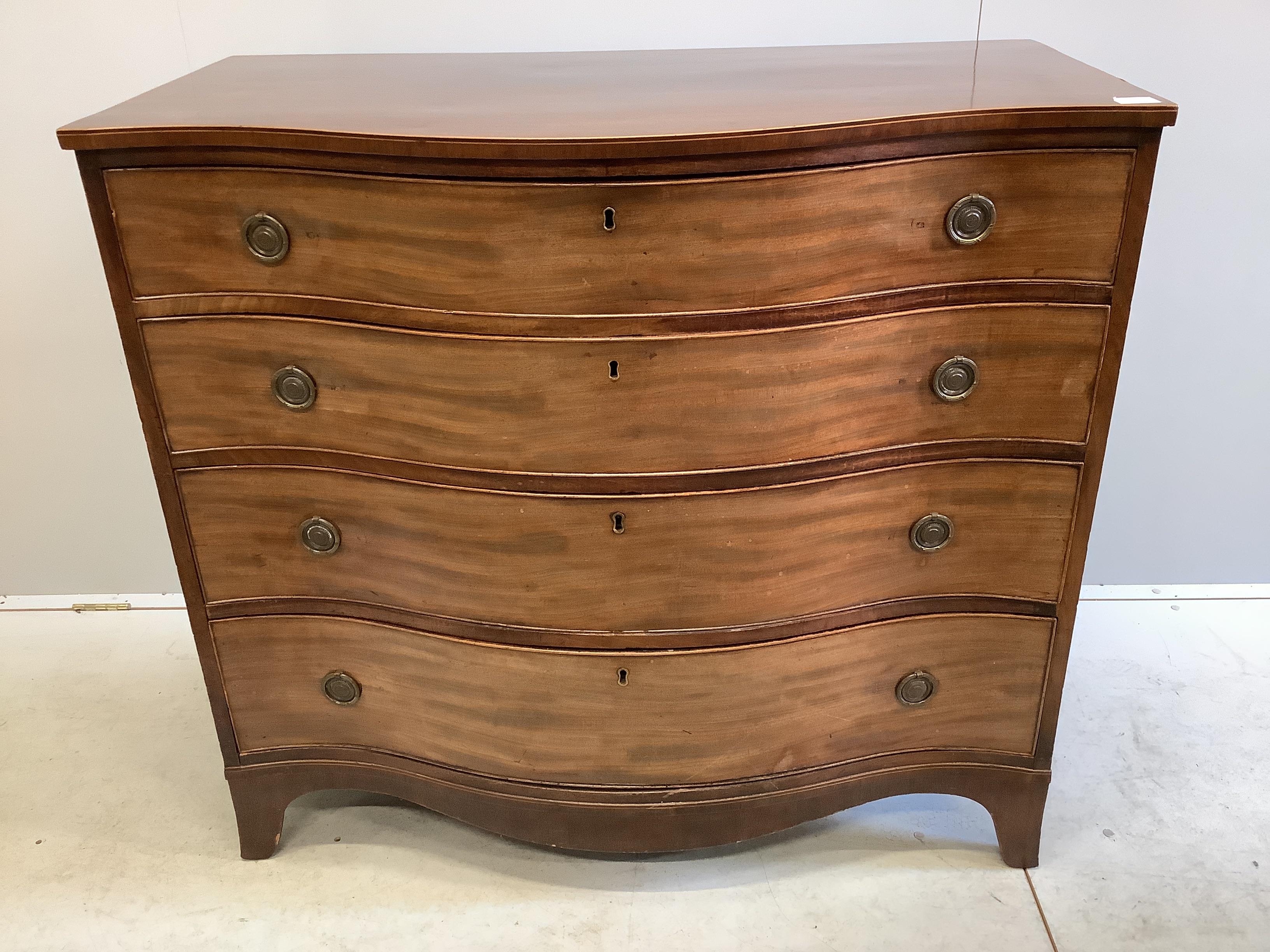 A George III mahogany serpentine four drawer chest, width 111cm, depth 59cm, height 101cm